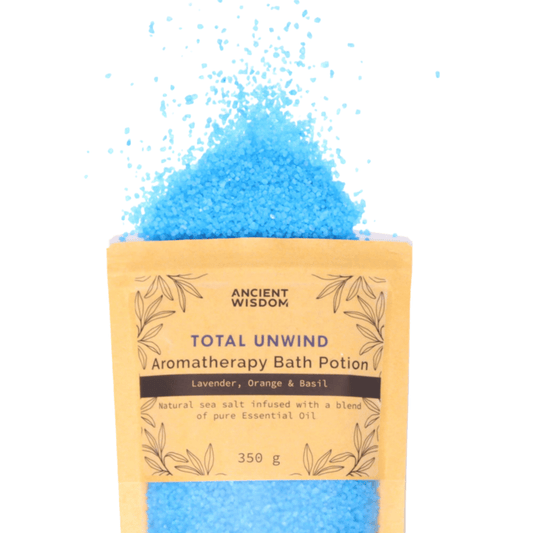 The blue Aromatherapy Bath potion natural sea salt bursting out of the kraft packet