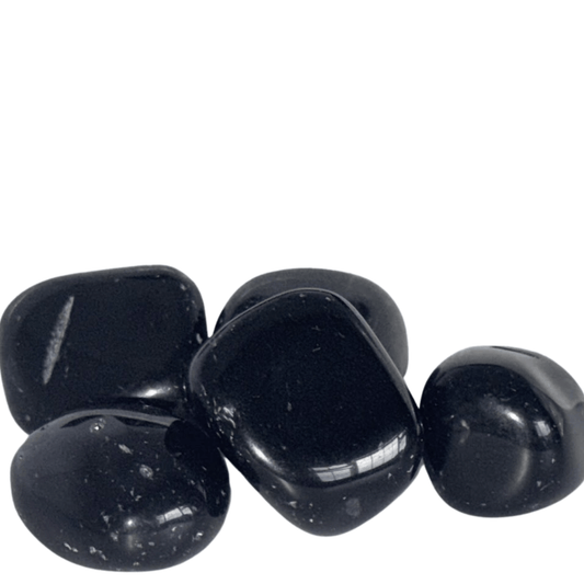 Black Obsidian stones on a white background