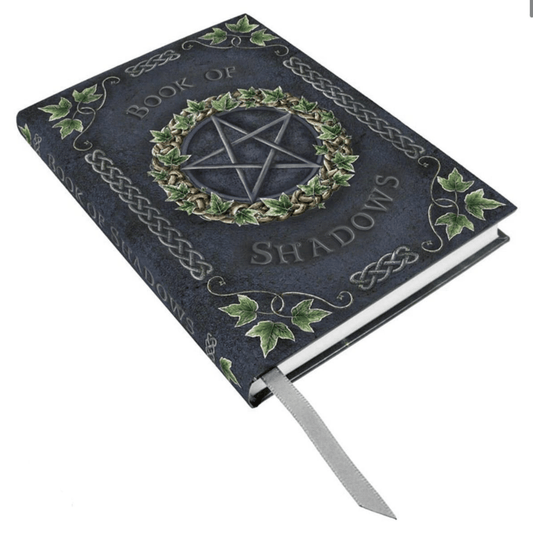 Decorative notebook titled 'Book of Shadows' with pentagram design on a white background