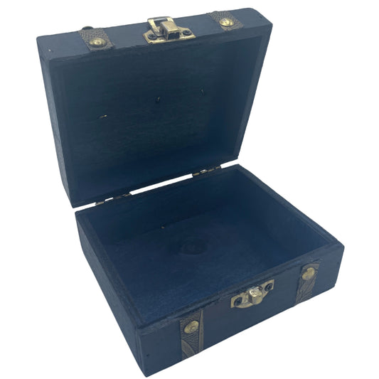 Open blue storage box with brass hardware on a white background