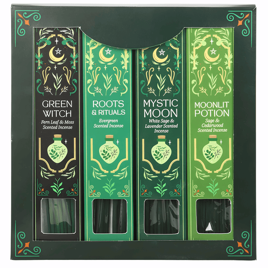 A boxed set of four scented incense sticks in dark green packaging with ornate gold and light green illustrations. The incense labels read Green Witch, Roots & Rituals, Mystic Moon, and Moonlit Potion.