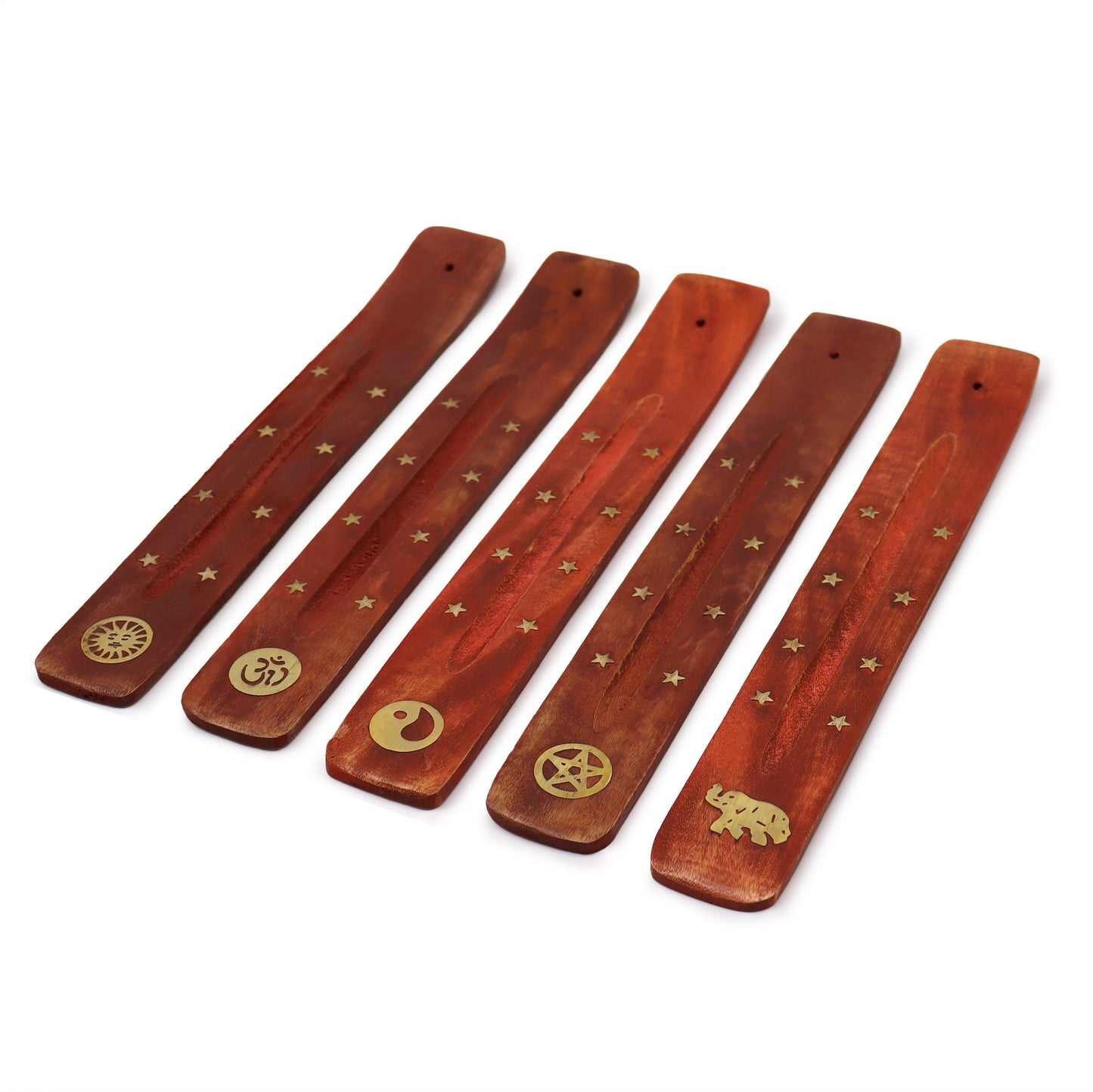 Set of five wooden incense sticks with gold symbols on a white background