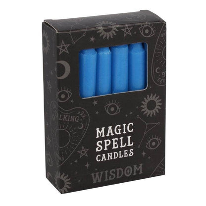 Box of blue spell candles with 'Magic Spell Candles Wisdom' text on a white background