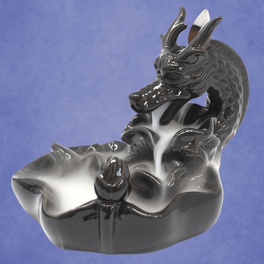 Dragon-shaped incense burner with smoke effect on a purple background
