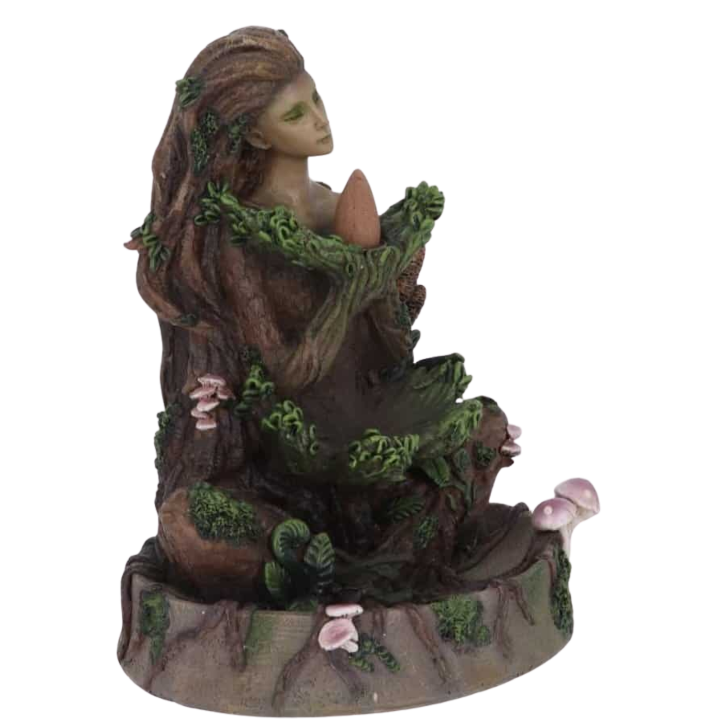 Statue of a fairy-like figure with long hair and greenery, sitting on a white background