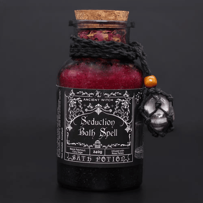 Bath potion bottle labeled 'Seduction Bath Spell' with decorative elements on a dark background