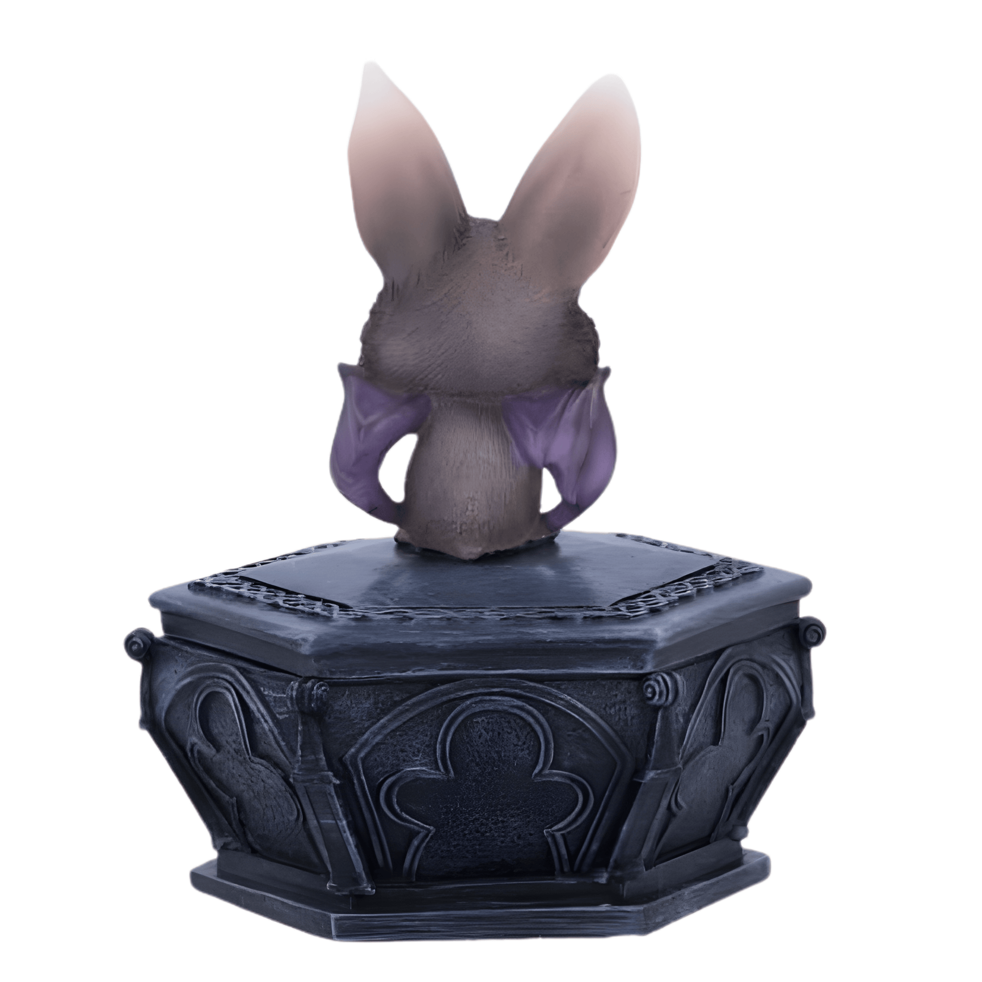 Back of a bat creature on a decorative black base with intricate designs