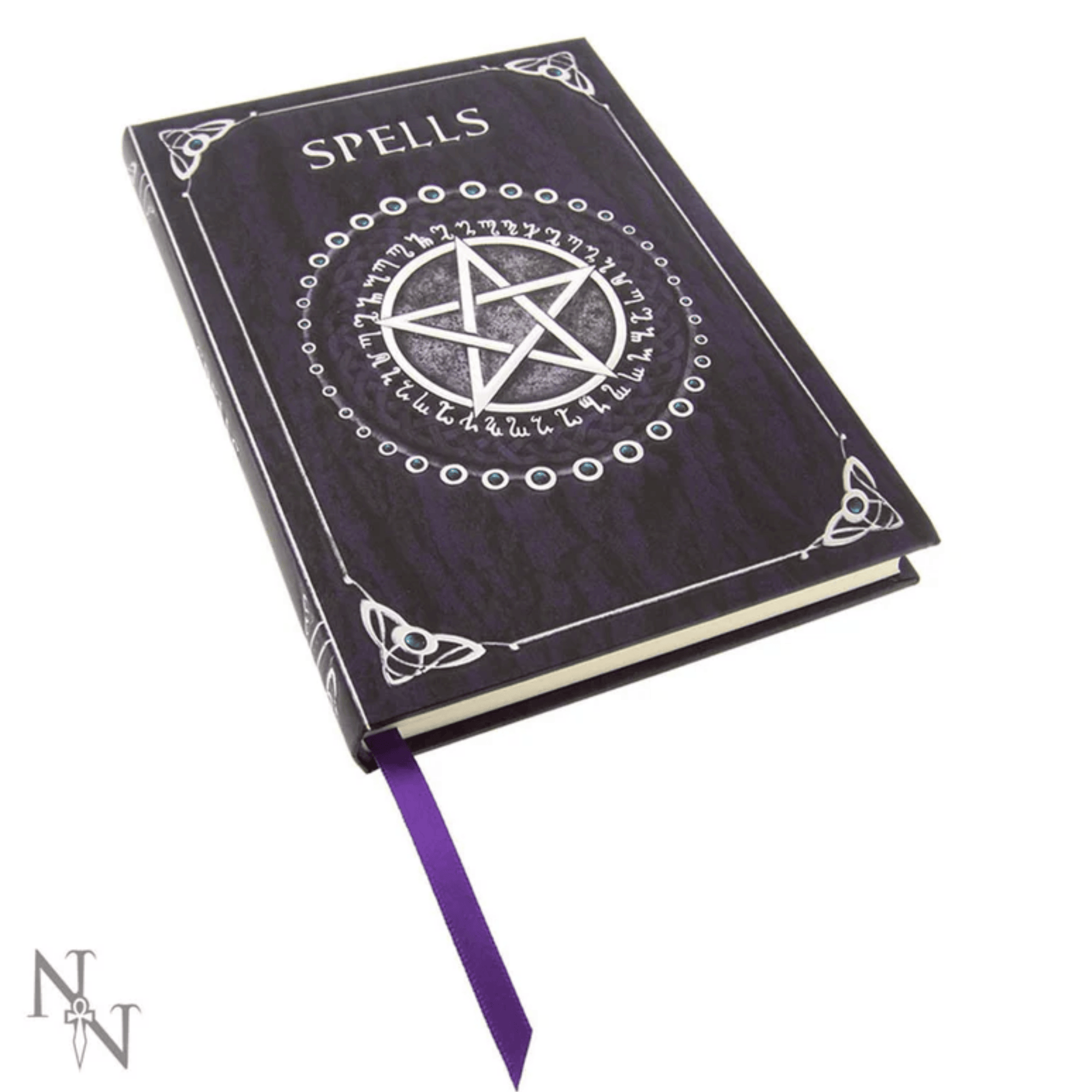 Book titled 'Spells' with a pentagram design on a white background