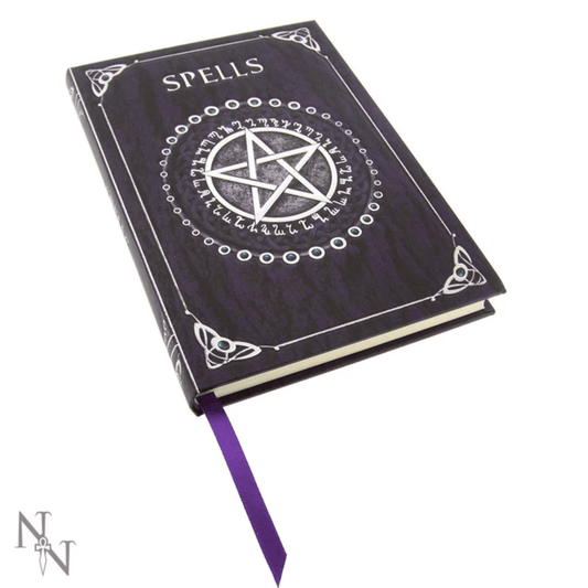 Book titled 'Spells' with a pentagram design on a white background