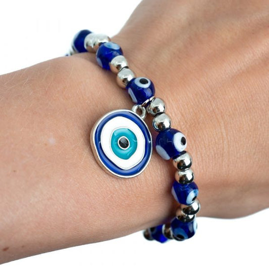 Bracelet with blue and silver beads on a person's wrist