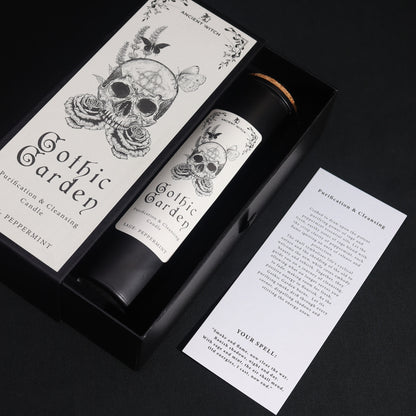 Gothic Garden Purification and Cleansing Candle with Sage and Peppermint by Spirit & Shadow – boxed black soy wax spell candle with skull and rose design and included ritual spell card