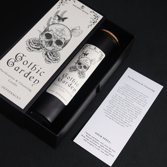 Gothic Garden Purification and Cleansing Candle with Sage and Peppermint by Spirit & Shadow – boxed black soy wax spell candle with skull and rose design and included ritual spell card