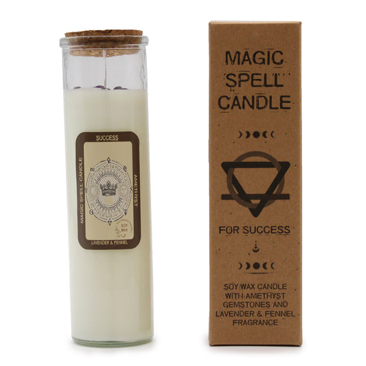 Glass Cylinder with soy candle wax and a picture label and the packaged box next to it on a white background