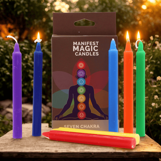 Set of 7 Chakra colour candles with a 'Manifest Magic Candles' packaging featuring seven Chakra symbols on a natural background.
