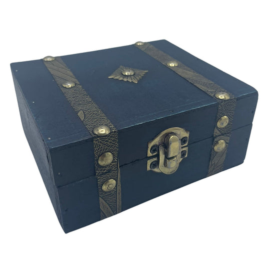 Blue wooden box with brass accents on a white background