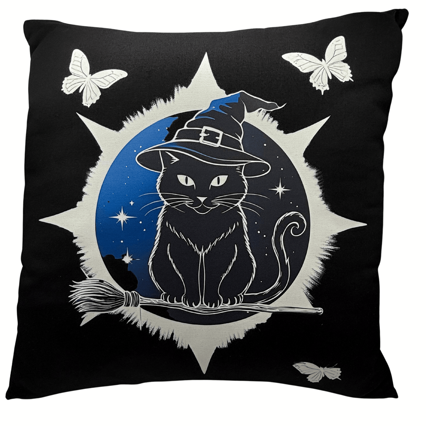 Black pillow with a cat wearing a witch hat, broom, and star design on a black background.