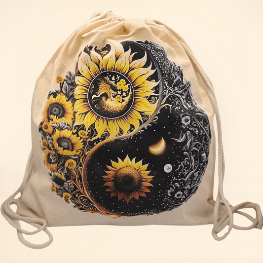 Drawstring bag with sunflower design featuring celestial yin yang elements on a beige background