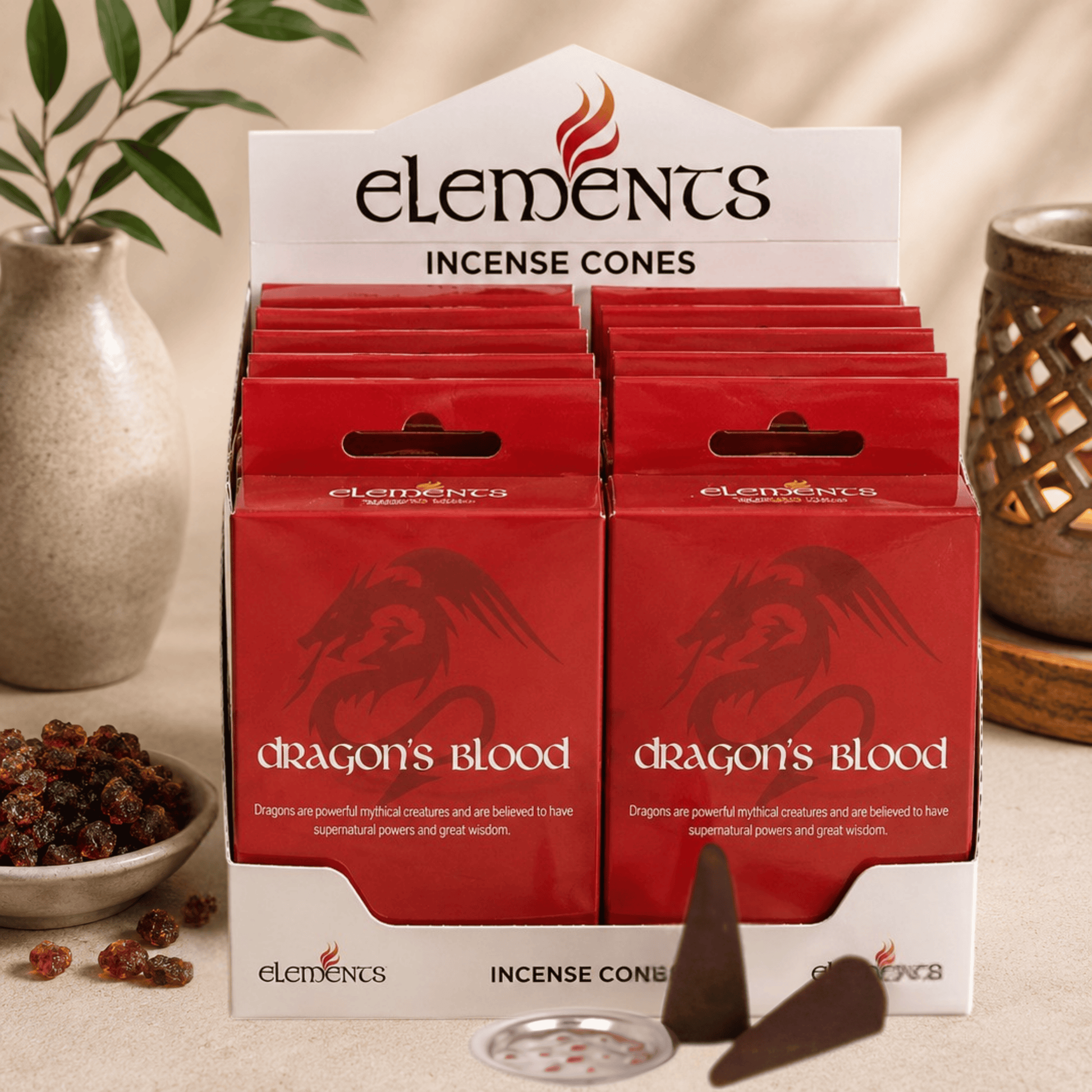 Display of Elements Dragon's Blood incense cones packaging on a neutral background.