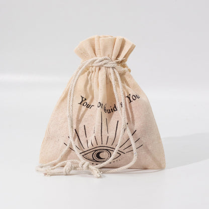 Beige drawstring bag with black text and symbol on a light gray background