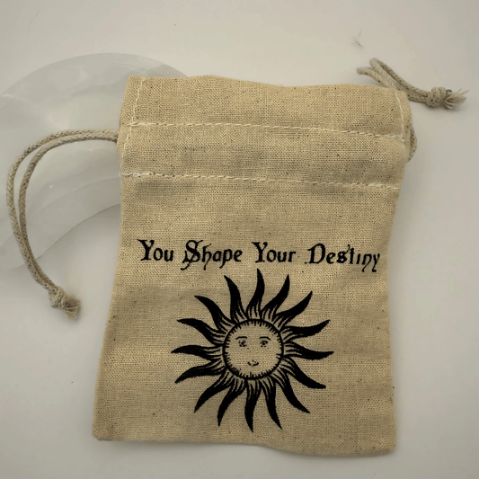 Hessian drawstring bag with sun design and 'You Shape Your Destiny' text on a white background