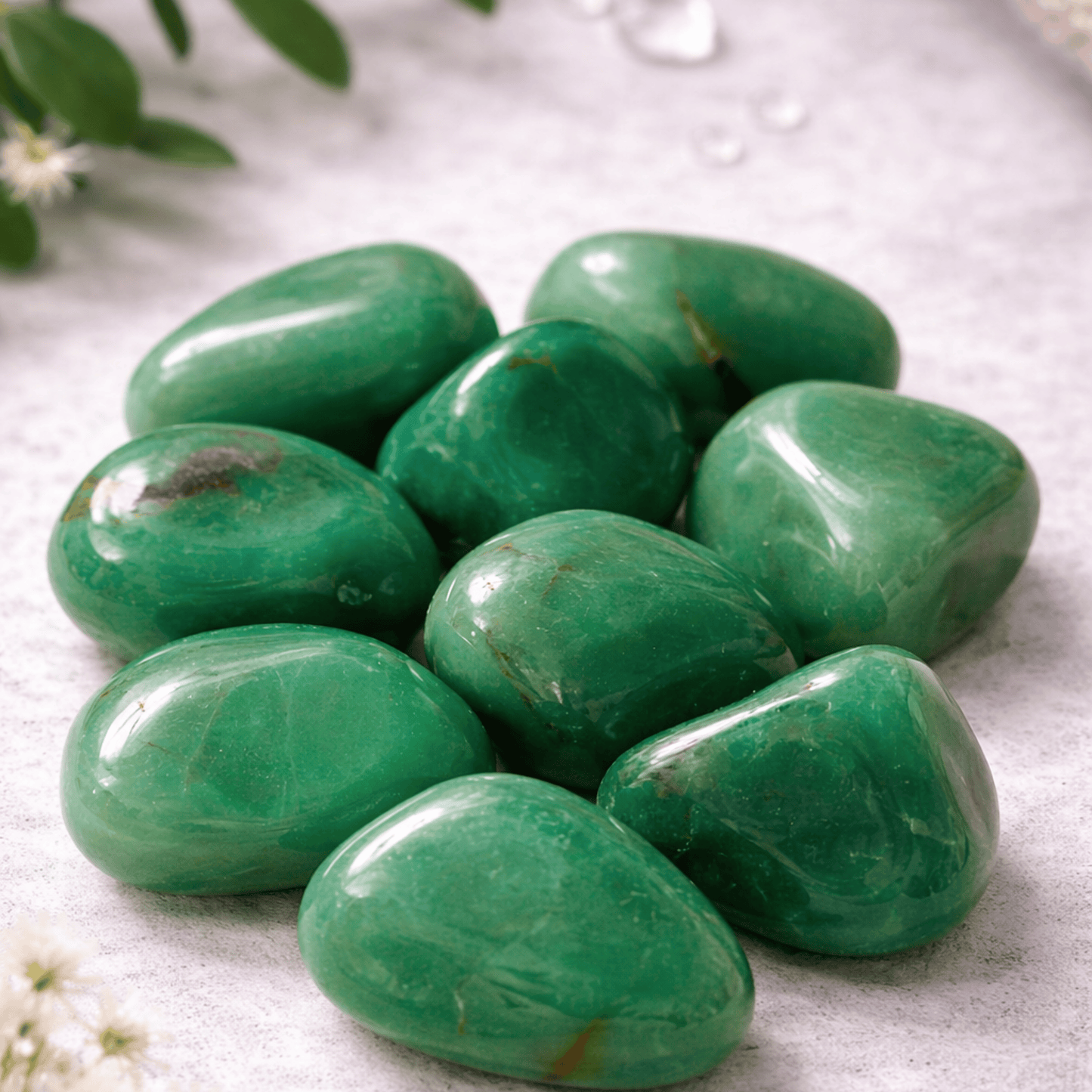Green Quartz Tumblestones on a light background