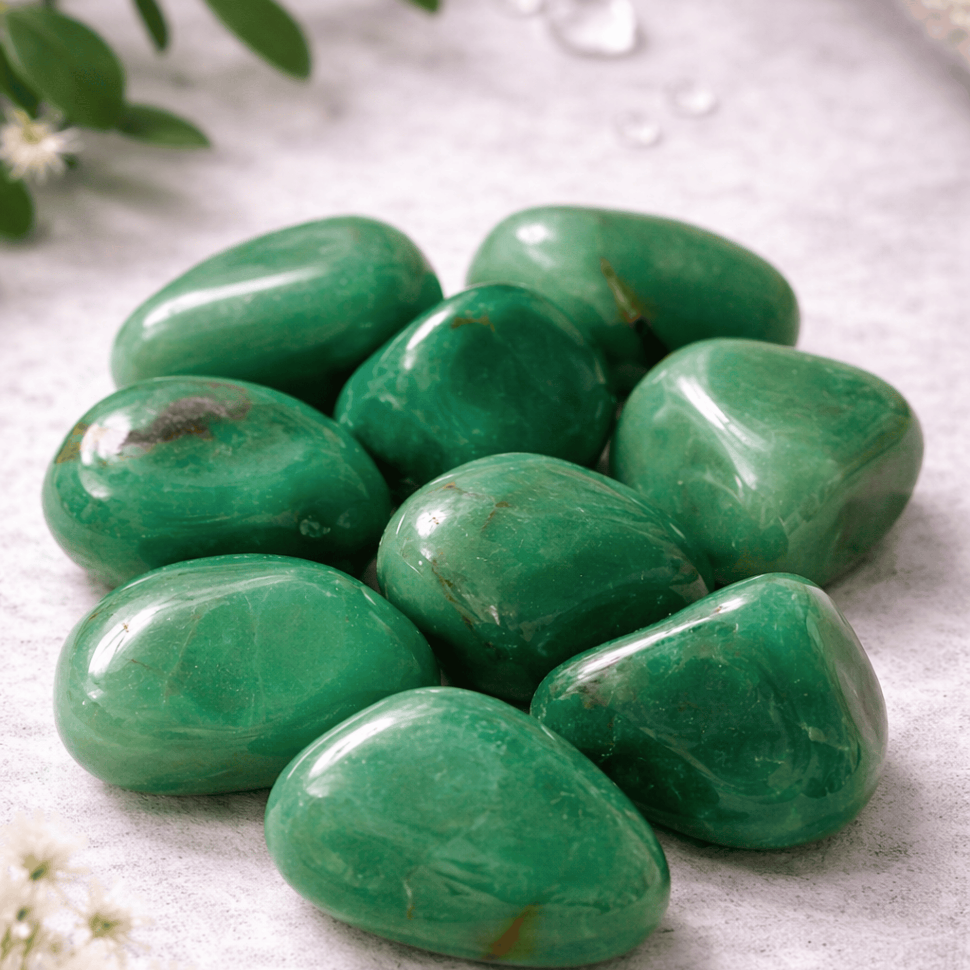 Green Quartz Tumblestones on a light background