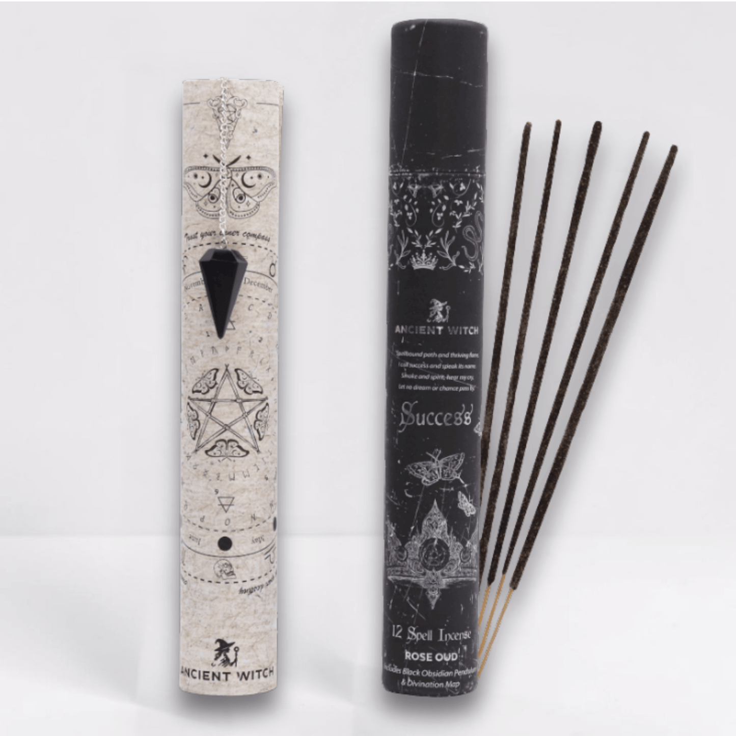 Incense sticks with packaging featuring star and pentacle designs on a white background and a black pointed crystal attached to a silver chain draped over a paper map.