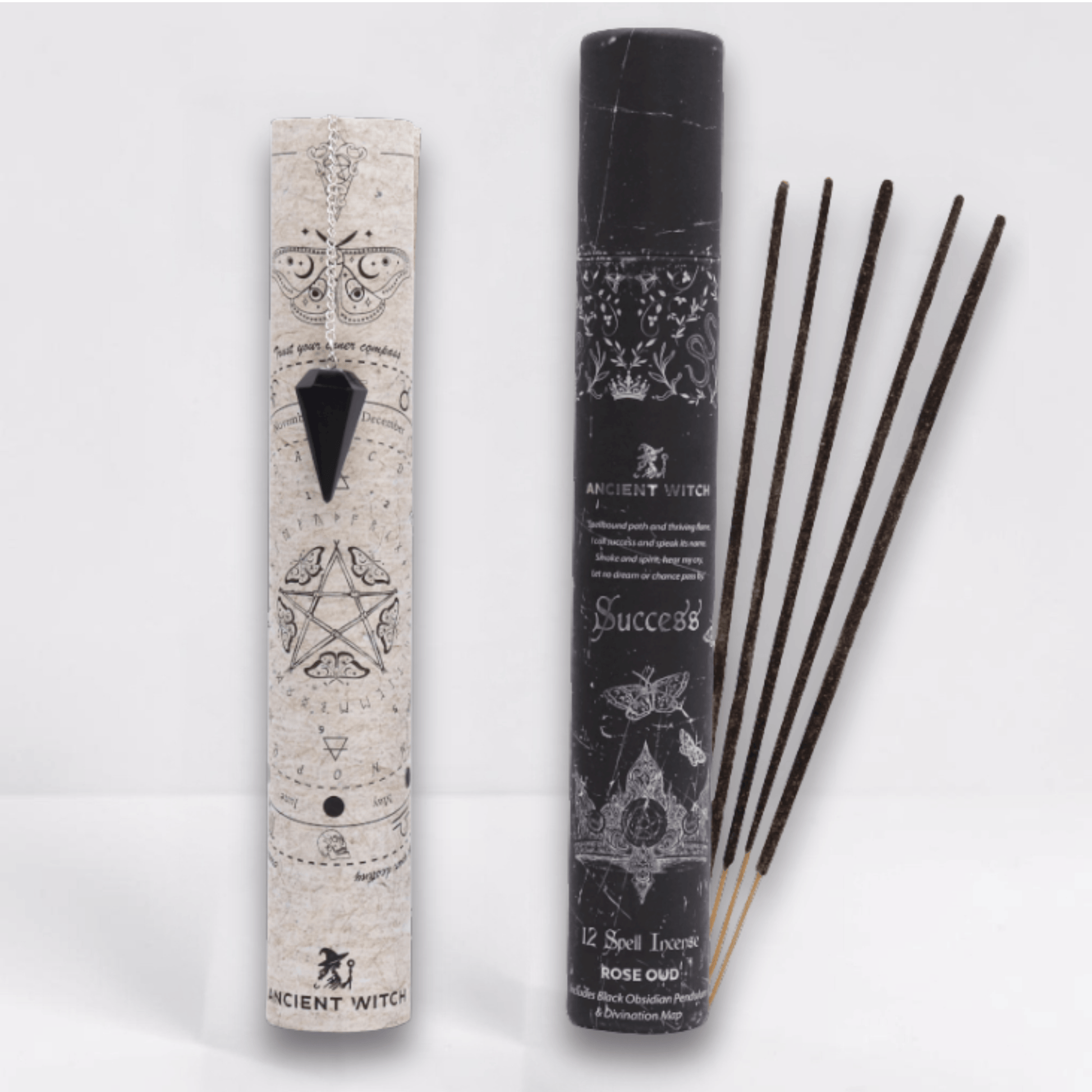 Incense sticks with packaging featuring star and pentacle designs on a white background and a black pointed crystal attached to a silver chain draped over a paper map.