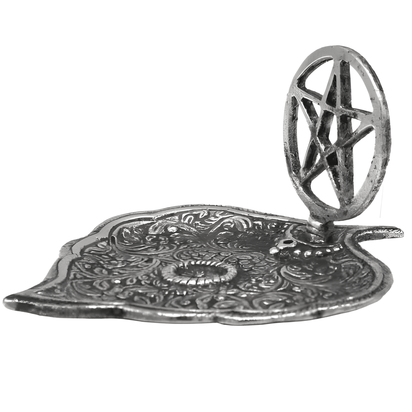 Decorative metal object with leaf design and central pentagram on a white background