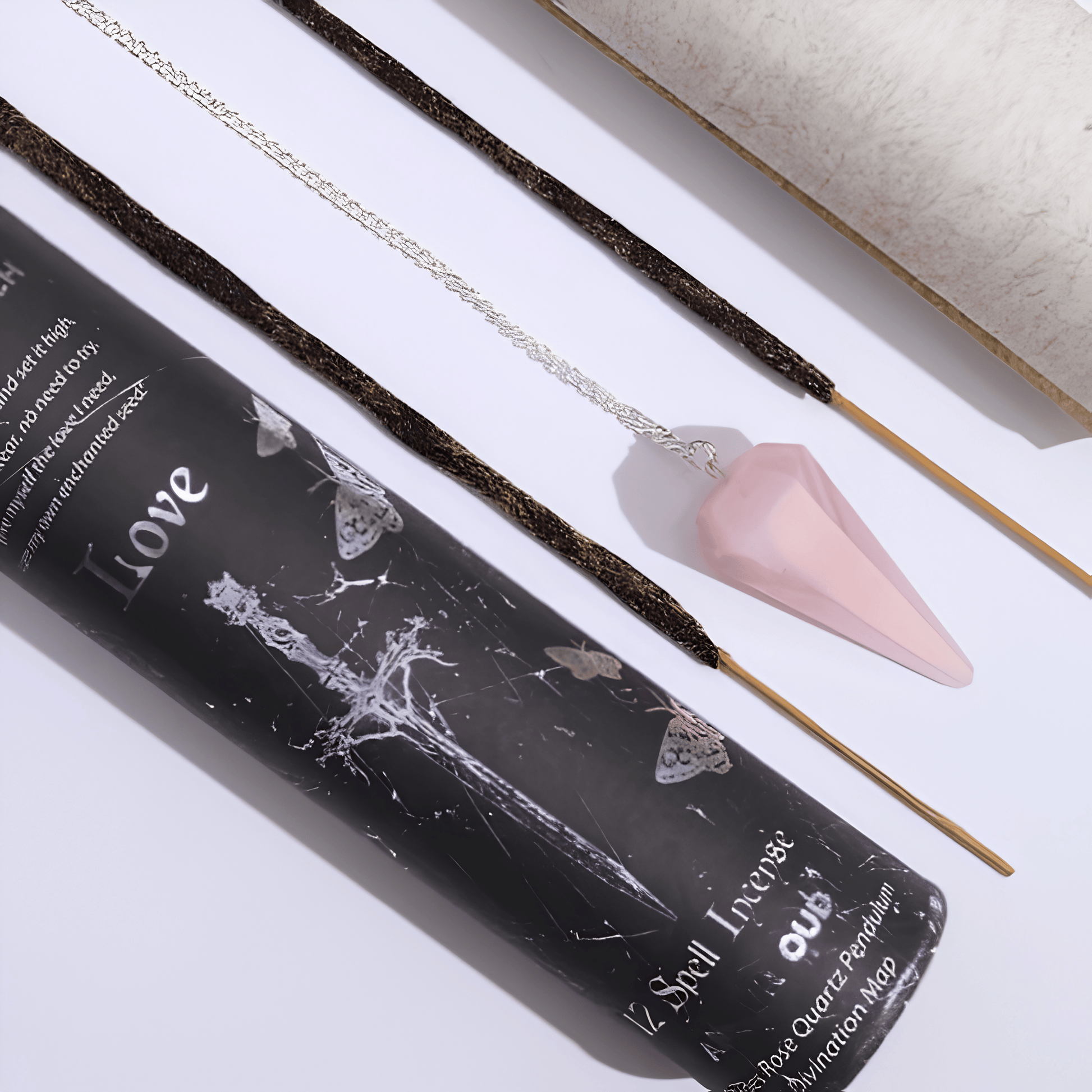 Incense sticks with a black packaging labeled 'Love' on a light background