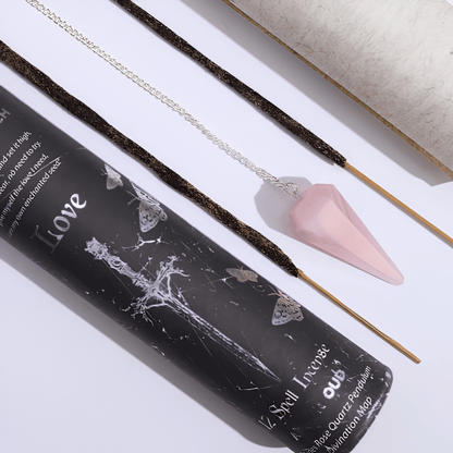 Incense sticks with a black packaging labeled 'Love' on a light background