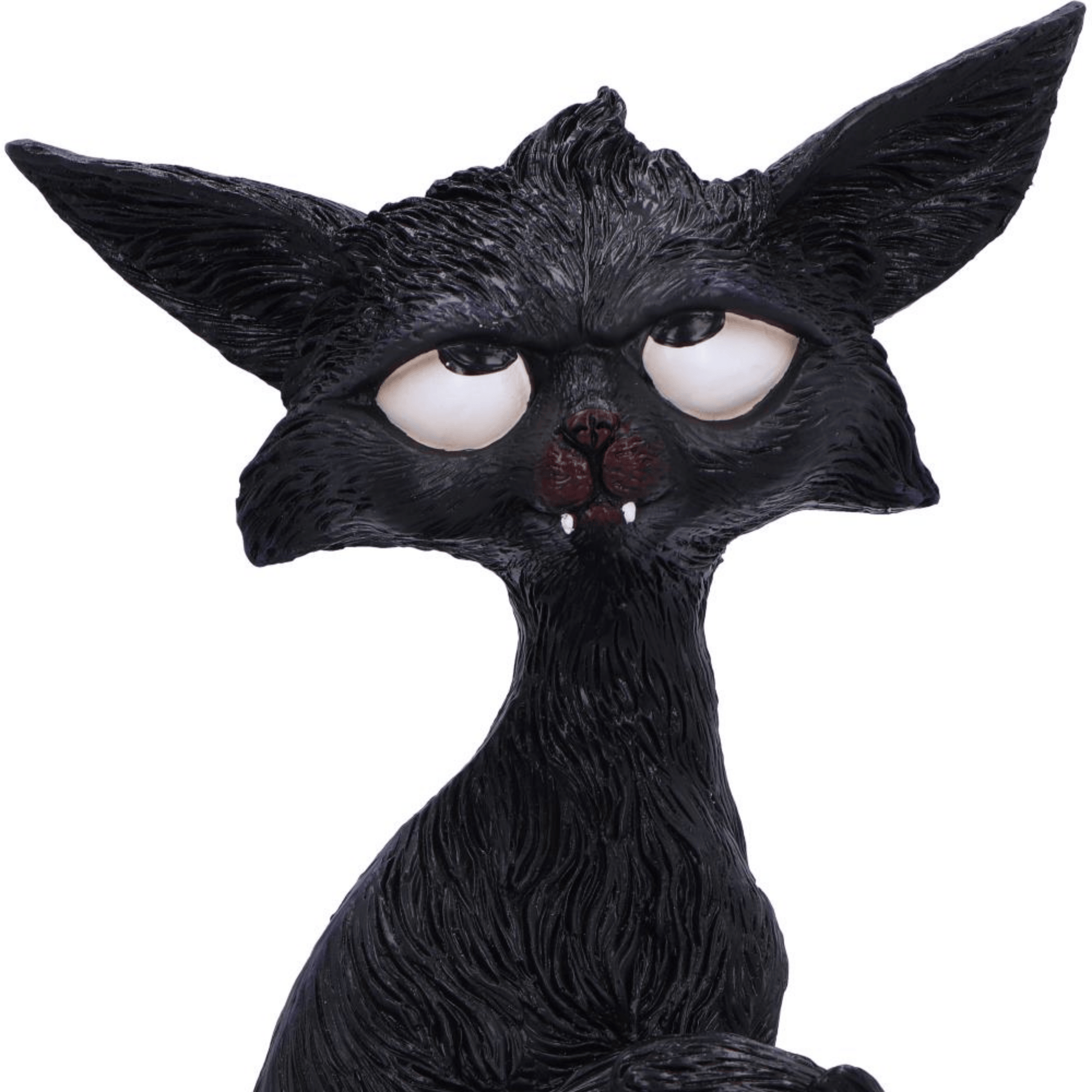 Black cat humorous figurine with white eyes looking up and large ears and little white fangs on a white background