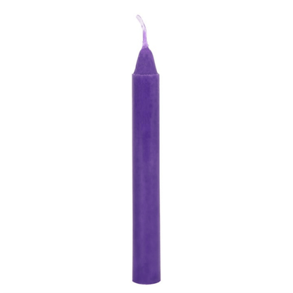 Purple candle on a white background