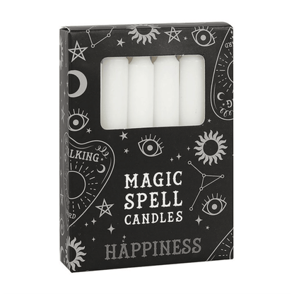 Box of 'Magic Spell Candles Happiness' with white candles inside on a white background