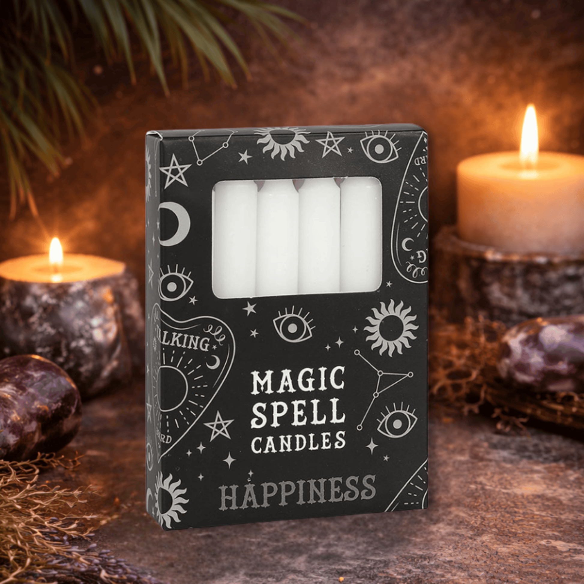 Box of 'Magic Spell Candles Happiness' with candles and mystical elements in the background