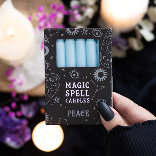 Pack of 'Magic Spell Candles Peace' with mystical designs on a dark background