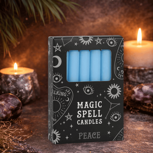 Box of blue 'Magic Spell Candles Peace' with wiccan symbols on a mystical background.