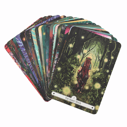 A fanned-out deck of illustrated oracle cards on a plain white background, with the front card titled "The Inner Witch" showing a forest scene with a figure and glowing lights.