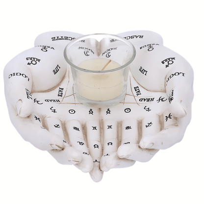 Heart-shaped candle holder with black text and symbols, containing a small candle on a white background.