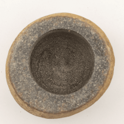 Ceramic bowl with textured surface on a white background