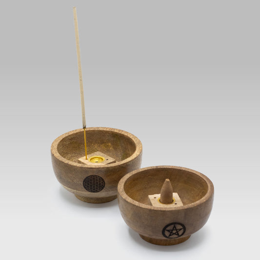 Two wooden incense holders with pentagram symbols on a white background