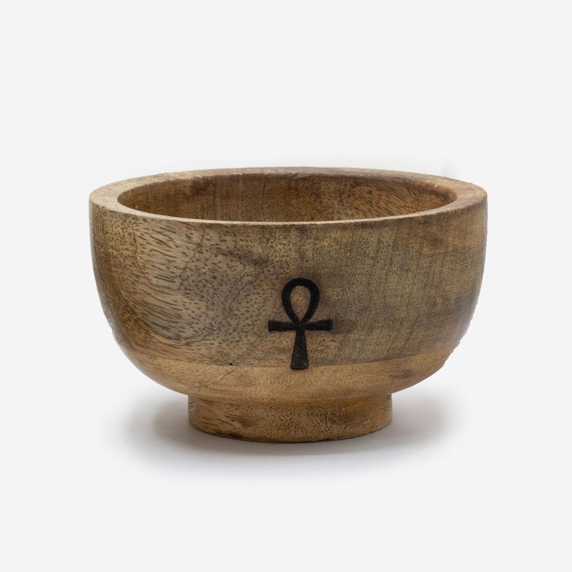 Wooden bowl with an ankh symbol on a white background