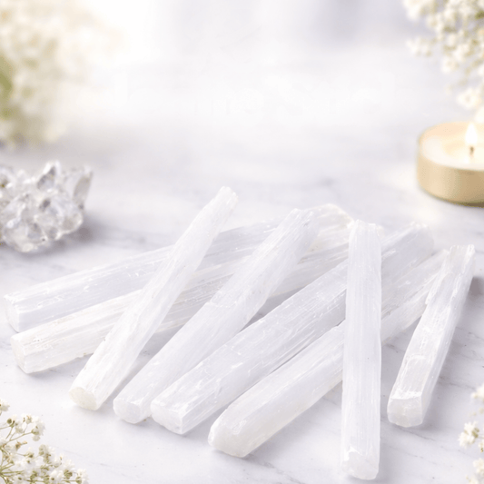Selenite sticks 16-20cm on a white background