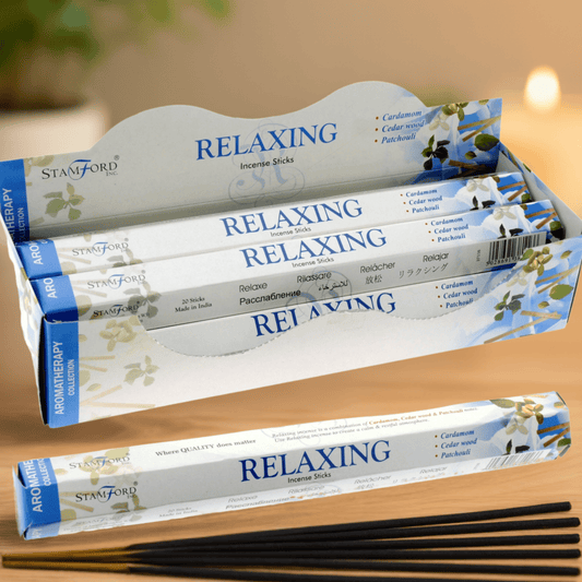 Packaging of Stamford Incense Sticks labeled 'Relaxing' on a wooden surface.