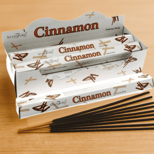 Box of Stamford cinnamon incense sticks on a wooden surface