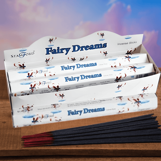 Box of Stamford Fairy Dreams incense sticks on a wooden table with a magical background