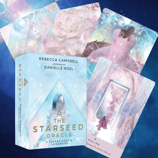 Starseed Oracle card set with packaging on a starry background