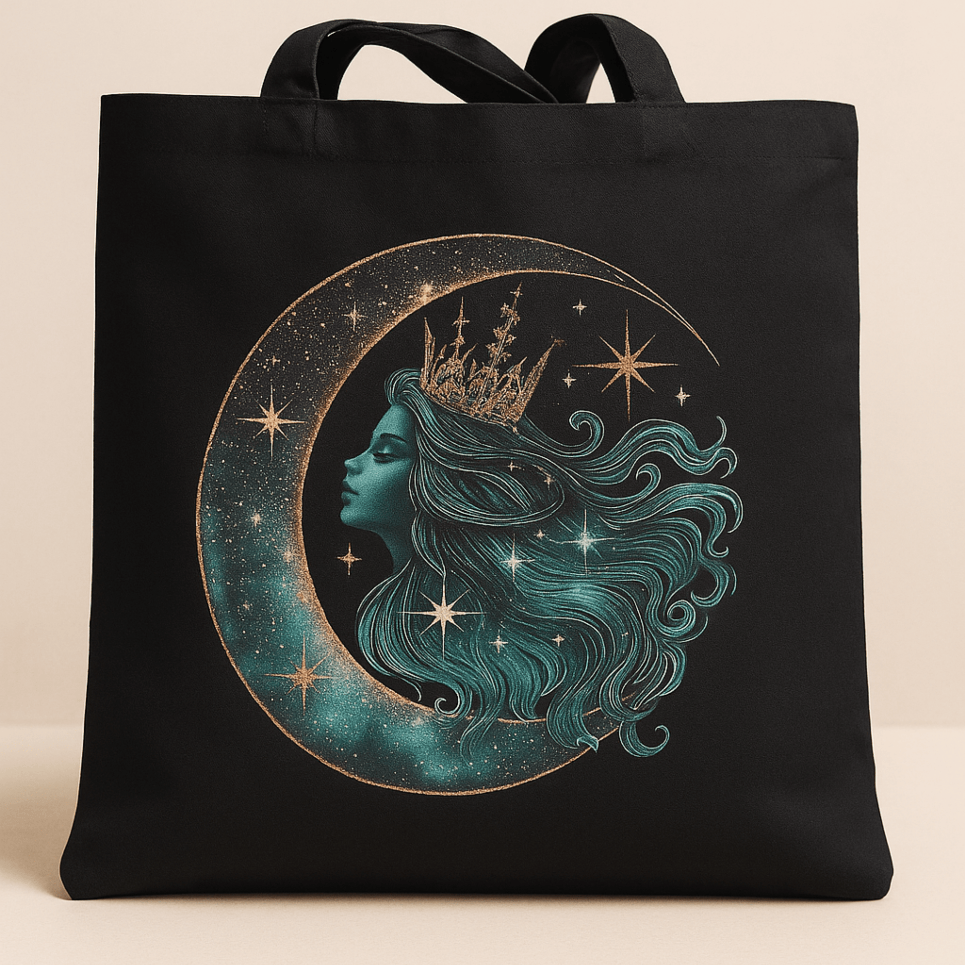 Black tote bag with a celestial design of a woman's face on a crescent moon with stars.