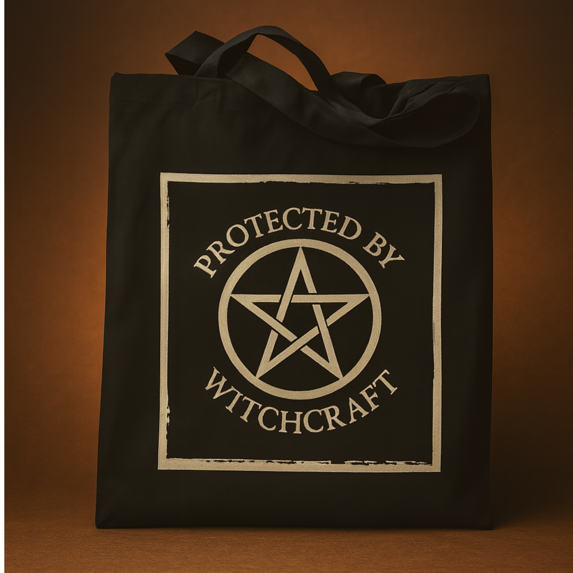 Black tote bag with 'Protected by Witchcraft' design on a gold background