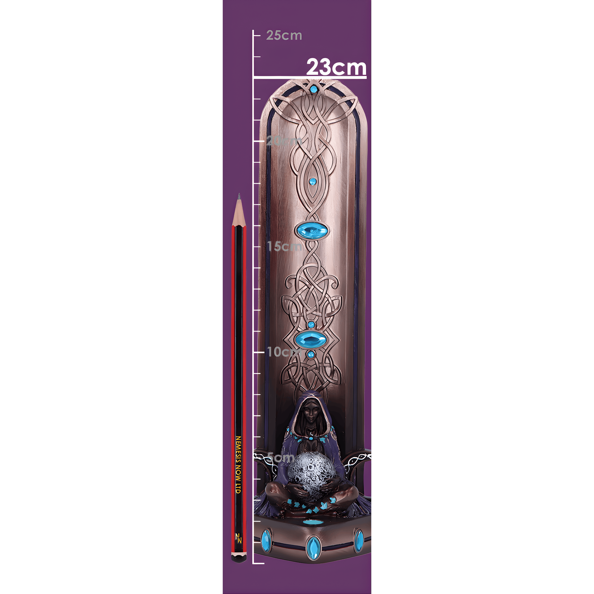 Decorative item with intricate design and measurement scale on a purple background